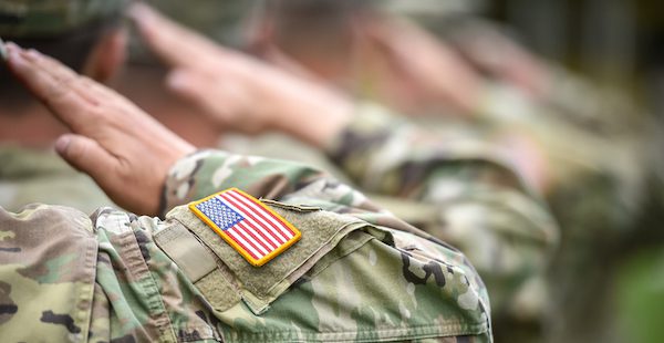 Military members saluting